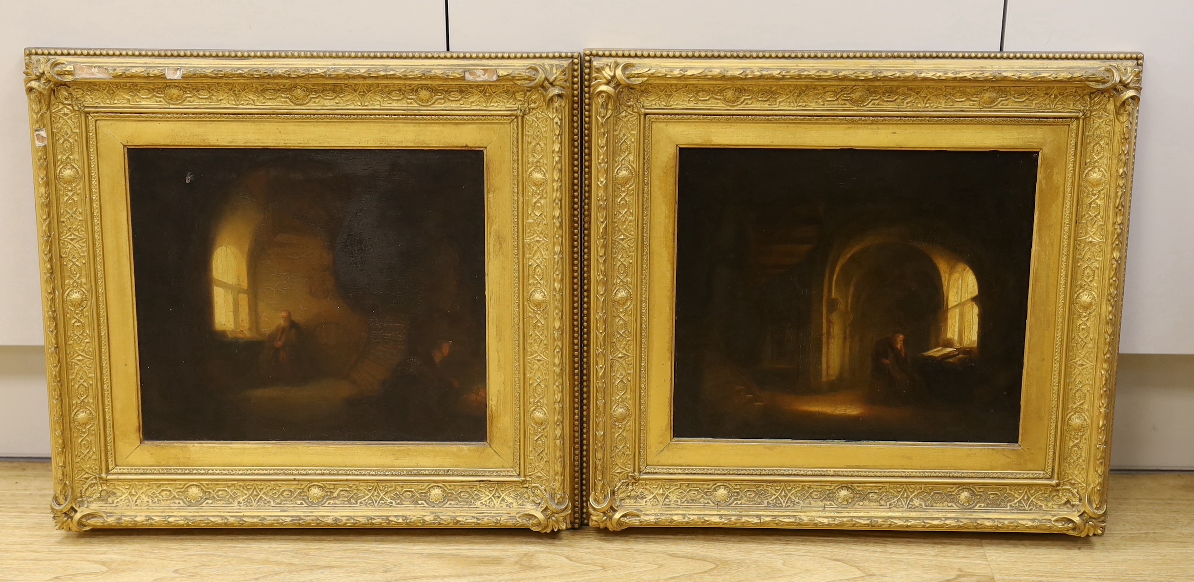 English School c.1840, pair of oils on wooden panels, Dimly lit interiors with seated figures, 28 x 32cm